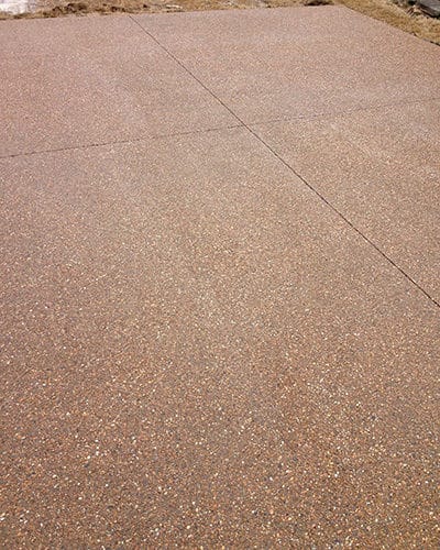 Sanders Construction and Remodeling brown speckled stamp concrete