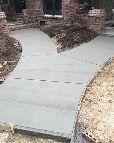 Sanders Construction and Remodeling grey outdoor stamp concrete