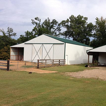 Sanders Construction LLC and Remodeling white sheet metal barn